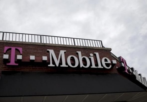 T-Mobile profit nearly triples, adds 2.1 million customers