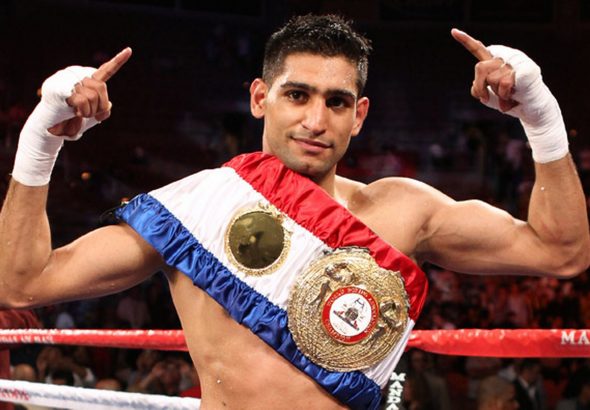 Khan to fight Alvarez